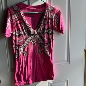 Like new in great condition women’s pink Xtrene Conture short sleeve tee.